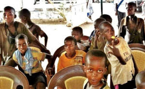 Children attracted by the theatrical skits