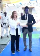 Buaro receives his diploma, celebration of success