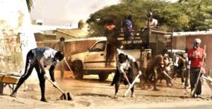 Issa (center) is at the heart of the action