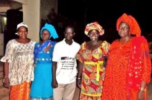 Idrissa with community leaders in Koungheul