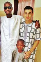 Liem with host brothers Maniang (left) and Babacar