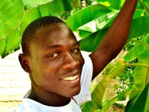 Mamadou with thriving Bango banana trees