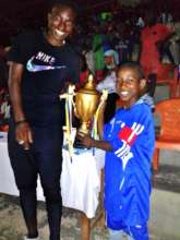 "Messi" accepts the trophy for the blue team