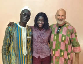 Christoph wearing his "boubou" with Aby and Ndaraw