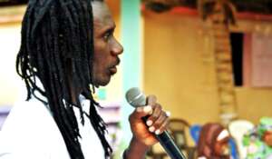 Issa Kouyate addresses the graduation assembly