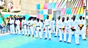 Students with proud new belt holders