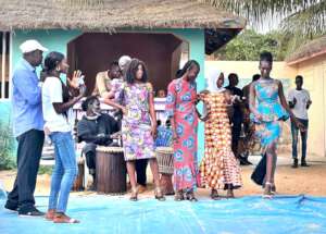 Modelling dresses made by the apprentices