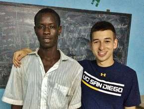 With Abou, who walked 2 hours each day to class