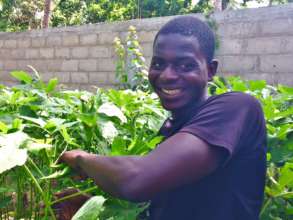 Proud of his okra crop at MDG's Bango property