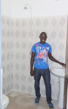 Mamadou admires one of the three new washrooms