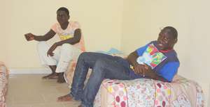 Talibes Ablaye and Mamadou hang out in new shelter