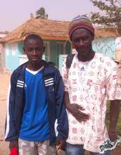 Arouna with Issa Kouyate at MDG centre in 2011