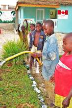Children committed to the center's garden oasis
