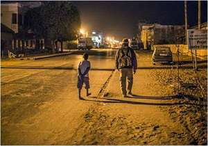 Issa with a child found sleeping in the street