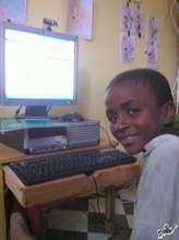Talibe Amadou Diao reading his email from Canada