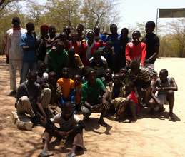 The talibes happily gather for a photo souvenir