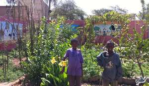 Talibe children checking out the flowers