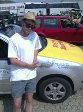 Dan with the Skoda, inscribed with MDG's logo