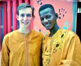 Sam and Iman in traditional Senegalese dress