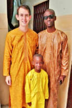 With host family members Maniang and Babacar