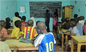 MDG teacher Aida with her class of talibe children