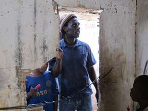 MDG founder Issa Kouyate entering a daara