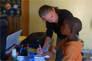 Gwen questioning a talibe child for the census