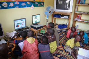 The boys learn how to use computers (and facebook)