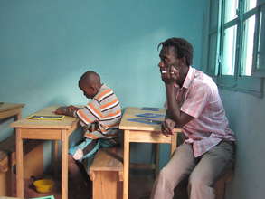 Student in classroom, with Issa