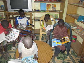 Talibes students reading in resource centre