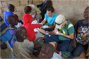 Tommaso providing health care in a daara
