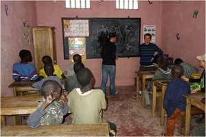Teaching a senior French class, in MDG's centre