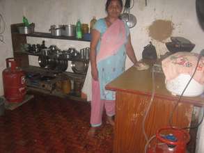 Caretaker  mother in  the kitchen