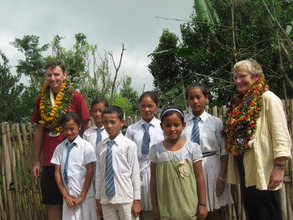 Michaela and  his mother with sponsored kids
