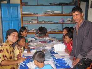 Jumoke  the  volunteer and the tutor with kids