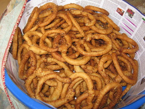 Sel Roti  cooked by  the care taker mother