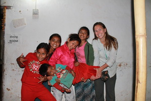 Lisa   our volunteer from  the USA with the kids