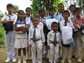 The children with  their new school dress