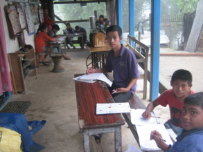 Deaf kids busy in their studies