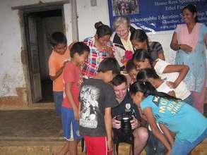 Michael and his mom visiting the orphanage