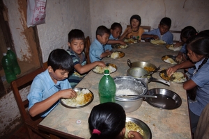 Children having their lunch at  the orphanage