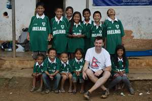 Michael distributed  Vests to the kids