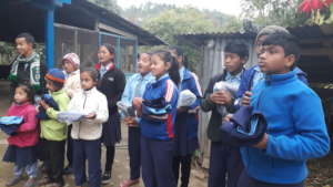 Kids receiving school dress
