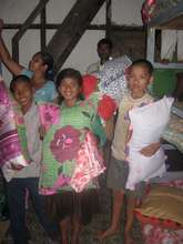 Children receiving bed clothes