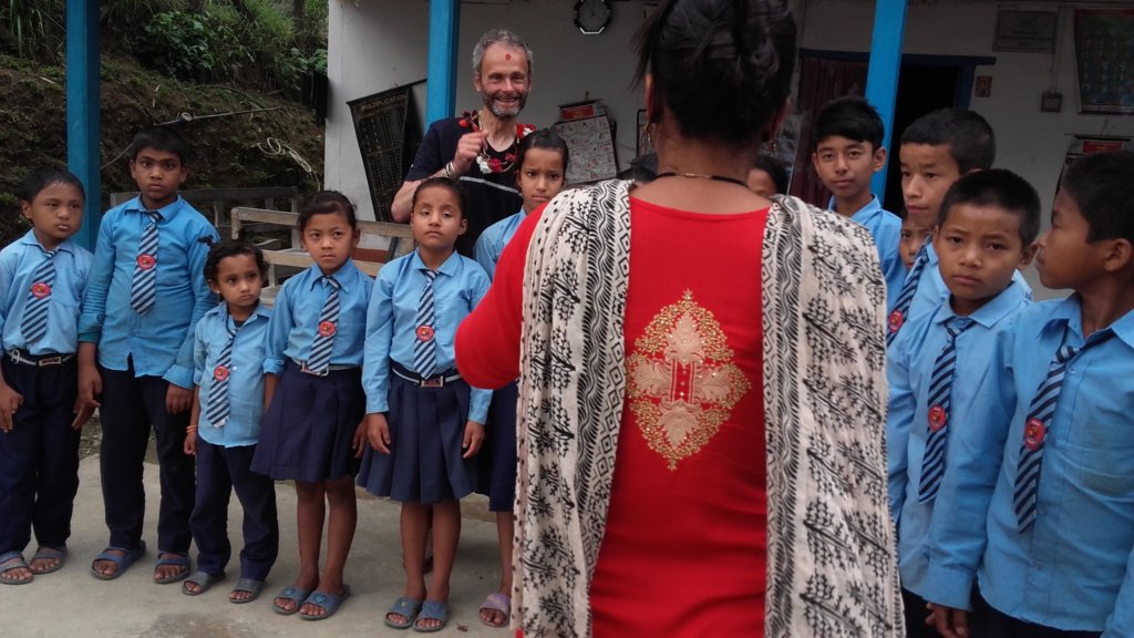 Provide materials to 15 deaf and mute Nepali kids.