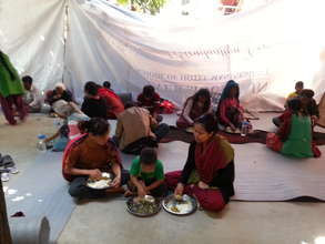 women and children in temporary shelter...