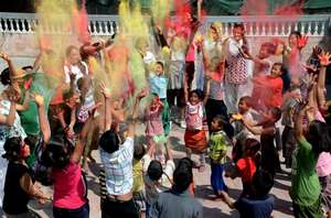 Celebrating Holi festival in Raksha Nepal