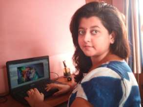 Moumita, working at her new job