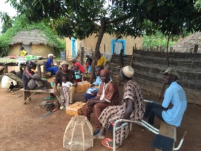 Presenting school supplies in Djendji village 2015