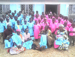 OVC wearing new uniforms, sewn by our trained tailors,